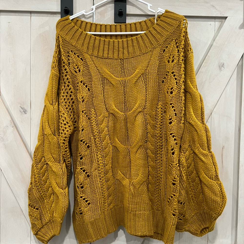Mustard yellow boutique sweater with balloon sleeves.
